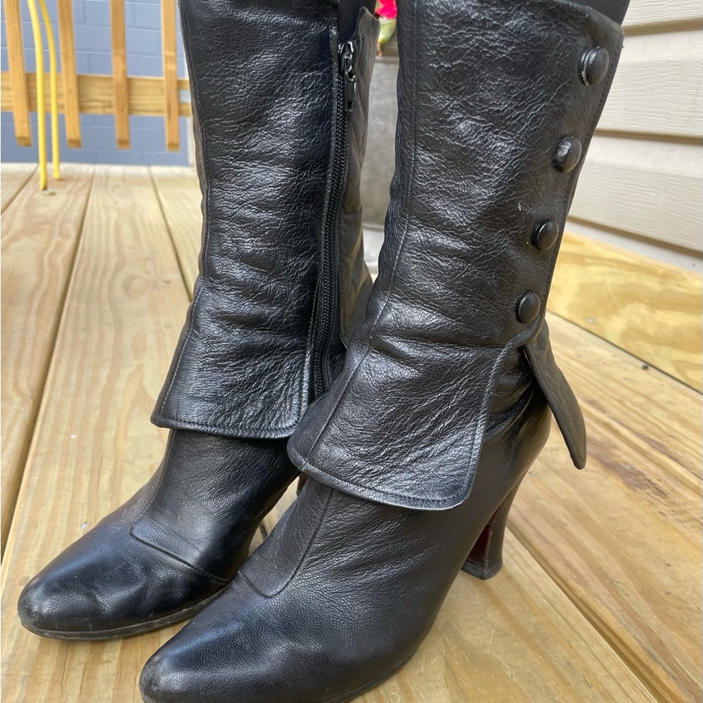 Chie Mihara black boots with beautiful button details.